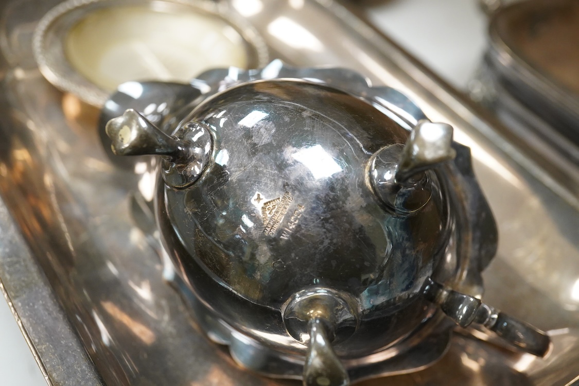 A pair of 19th century plated warming dishes- 36cm wide, a jug, a small plate and dish and cover, (5).